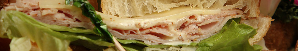 Eating Sandwich at Lindy's Subs & Salads - La Crosse restaurant in La Crosse, WI.